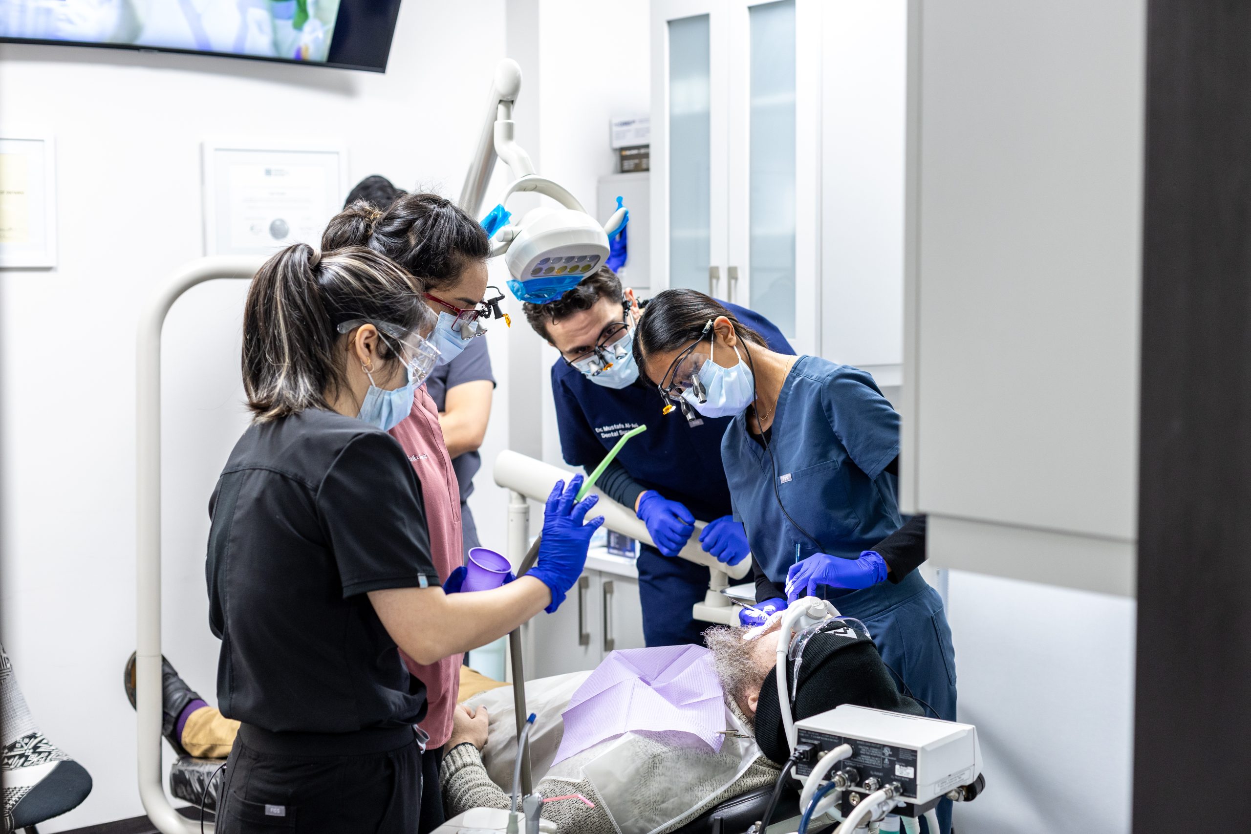Dental Professionals conducting services.